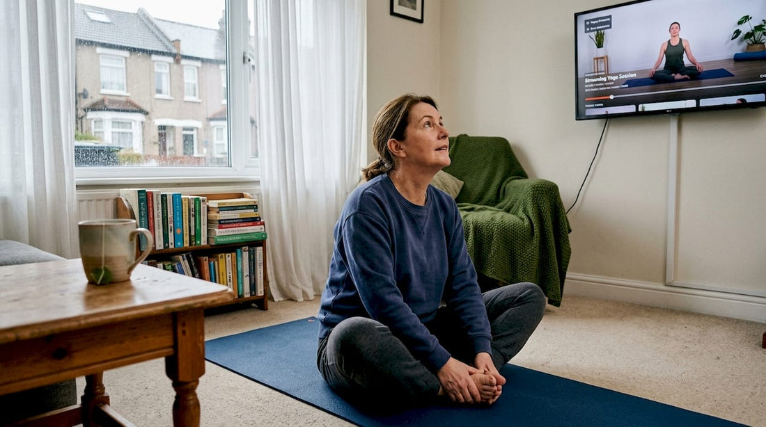 Middle-aged woman doing lymphatic stretch at home