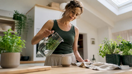 Woman practicing lymphatic wellness routine at home